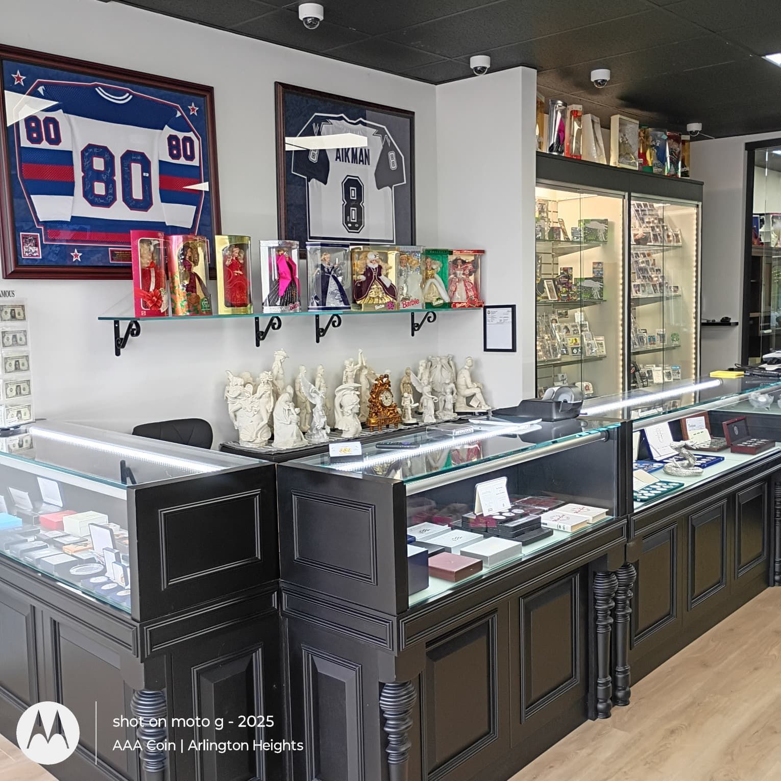 AAA Coin showcase with miscellaneous in-store collectible finds
